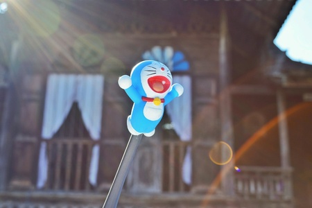 Doraemon smile to sunlight in the morning.