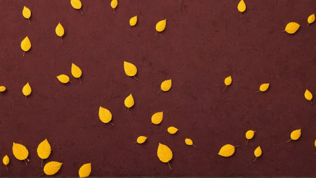 Autumn leaves on a brown background. Flat lay, top view.