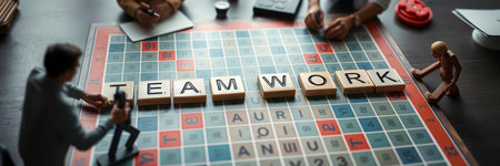Teamwork concept. Group of people sitting at table and playing board gameの写真素材