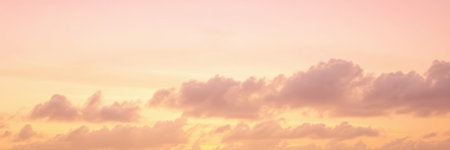 Sunset sky background with tiny clouds. Panoramic image.