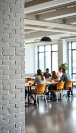 Interior of a modern office with white brick wall and people on the backgroundの写真素材