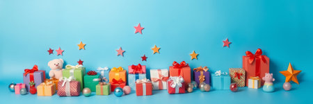 Gift boxes and teddy bear on blue background. Christmas and New Year concept.