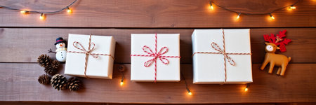 Christmas or New Year background with gift boxes and decorations on wooden backgroundの写真素材