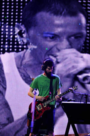 BANGKOK THAILAND SEPTEMBER 23 :Brad Delson of Linkin Park perform on Linkin Park Live in Bangkok A Thousand Suns World Tour 2011 at Impact Maungthong Thani, September 23,2011 Bangkok Thailandのeditorial素材
