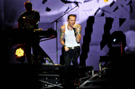 BANGKOK THAILAND SEPTEMBER 23 :Chester Bennington of Linkin Park perform on Linkin Park Live in Bangkok A Thousand Suns World Tour 2011 at Impact Maungthong Thani, September 23,2011 Bangkok Thailandのeditorial素材