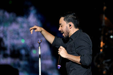 BANGKOK THAILAND SEPTEMBER 23 :Mike Shinoda of Linkin Park perform on Linkin Park Live in Bangkok A Thousand Suns World Tour 2011 at Impact Maungthong Thani, September 23,2011 Bangkok Thailandのeditorial素材