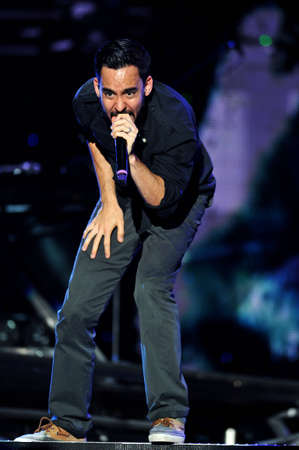 BANGKOK THAILAND SEPTEMBER 23 :Mike Shinoda of Linkin Park perform on Linkin Park Live in Bangkok A Thousand Suns World Tour 2011 at Impact Maungthong Thani, September 23,2011 Bangkok Thailandのeditorial素材