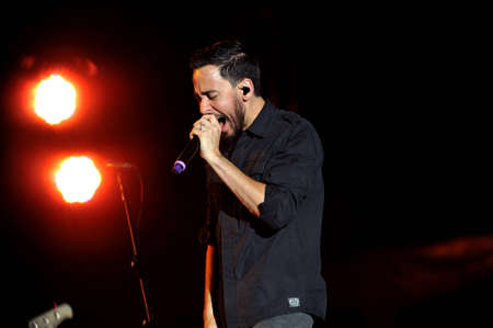 BANGKOK THAILAND SEPTEMBER 23 :Mike Shinoda of Linkin Park perform on Linkin Park Live in Bangkok A Thousand Suns World Tour 2011 at Impact Maungthong Thani, September 23,2011 Bangkok Thailandのeditorial素材