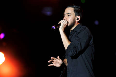 BANGKOK THAILAND SEPTEMBER 23 :Mike Shinoda of Linkin Park perform on Linkin Park Live in Bangkok A Thousand Suns World Tour 2011 at Impact Maungthong Thani, September 23,2011 Bangkok Thailandのeditorial素材