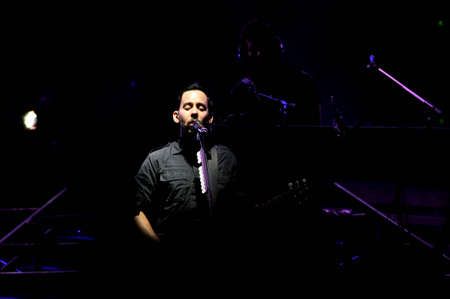 BANGKOK THAILAND SEPTEMBER 23 :Mike Shinoda of Linkin Park perform on Linkin Park Live in Bangkok A Thousand Suns World Tour 2011 at Impact Maungthong Thani, September 23,2011 Bangkok Thailandのeditorial素材
