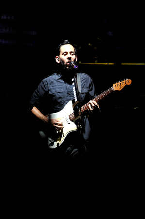 BANGKOK THAILAND SEPTEMBER 23 :Mike Shinoda of Linkin Park perform on Linkin Park Live in Bangkok A Thousand Suns World Tour 2011 at Impact Maungthong Thani, September 23,2011 Bangkok Thailandのeditorial素材