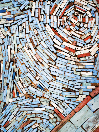 Closeup colorful scrap wood wall.の写真素材