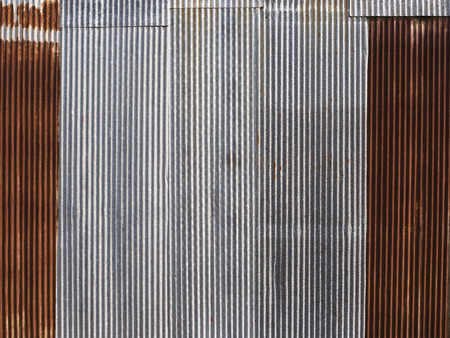 Rusted, galvanized, corrugated iron siding, vintage background.の写真素材