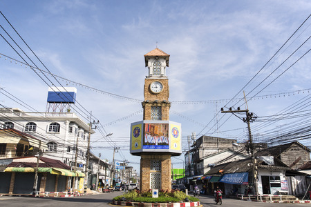 BETONG, THAILAND - DECEMBER 10: The clock tower of Betong, Thailand with the usual traffic in Betong, Thailand on December 10, 2015のeditorial素材