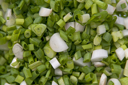 Chopped fresh green spring onions.の写真素材