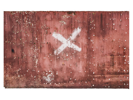 Old damaged metal surface with x letter isolated on white background.の写真素材