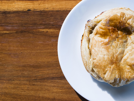 Puff on white plate. (Top view)の写真素材