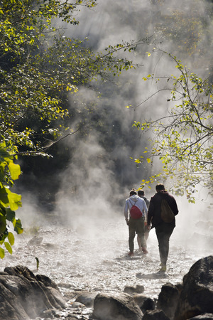 Back of the men tourist at Ta Pai Hot spring, Pai, Mae Hong Son Provine, Thailand.  (Selective Focus)の写真素材