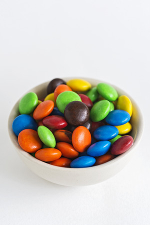 Close Up of A Pile of Colorful Chocolate Coated Candy.の写真素材
