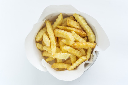 French Fries in a dish on White Background.