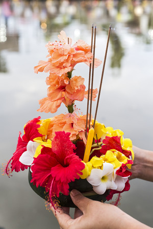Kratong made from flowers on hand. (Selective focus)の写真素材