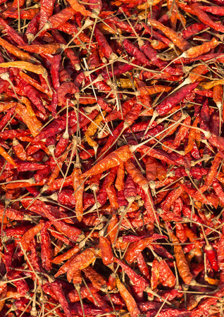 Pile of Dried Red Chili Peppers Background. (Top View)の写真素材