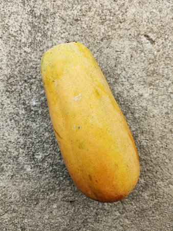 Closeup fresh papaya. The ripe fruit of the papaya is usually eaten raw, without skin or seeds.の写真素材