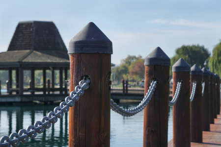 Perspective of wooden poles on the bridge  in the garden.の写真素材