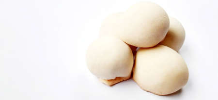 Delicious sweet round baked cake with negative space isolated on the gray white studio background....
