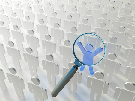 Searching for the right person. Loupe over the blue human figure standing out of the grey crowdの写真素材