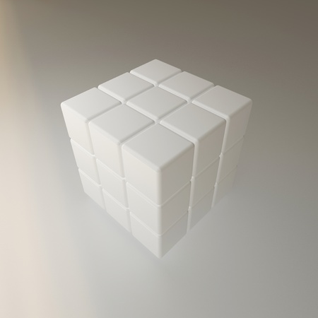 White abstract puzzle cube 3x3 blocks over blank grey backgroundの写真素材