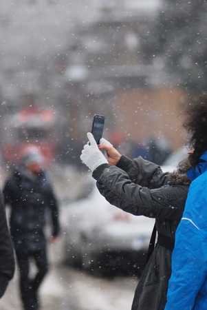 Person making selfie in winterの写真素材
