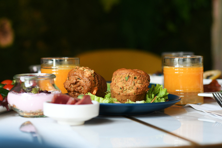 Healthy breakfast with orange juice on a tableの写真素材