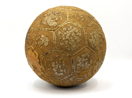 Old soccer ball on white backgroundの写真素材