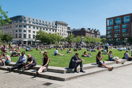 Manchester, England - 19 July 2016 : Piccadilly Gardens is a green space in Manchester city centre, between Market Street and the edge of the Northern Quarter on 19 July 2016 in Manchester, Englandのeditorial素材