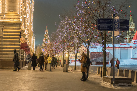 Moscow, Russia- December 16, 2016: People walking around GUM mall with Christmas lightings. GUM is large shopping mall in the center of Moscow.のeditorial素材
