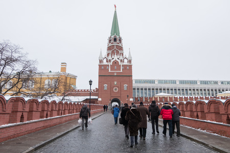 Moscow, Russia. 17 December 2016 : People walking in front of the entrance, Spasskaya Tower of...