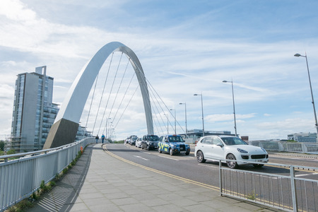 Glasgow, Scotland - 17 September 2016 : Clyde Arc Bridge and Buildings along Clyde River in Glasgow, United Kingdom.のeditorial素材