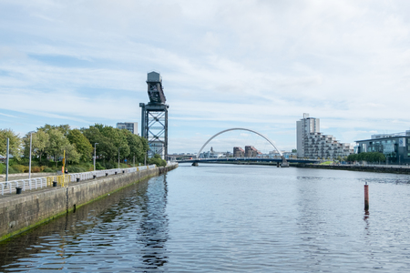 Glasgow, Scotland - 17 September 2016 : Clyde Arc Bridge and Buildings along Clyde River in Glasgow,...