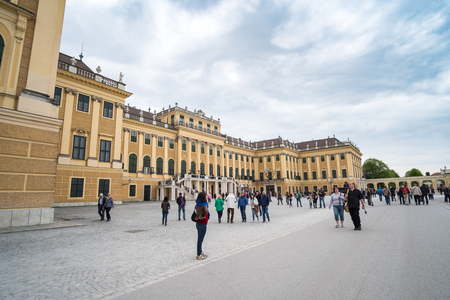 Vienna, Austria - 15 April 2017 : People walking around Schonbrunn Palace in Vienna. the Baroque palace which is a former imperial summer residence in Vienna.のeditorial素材