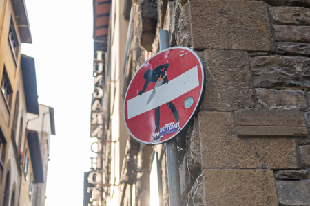 Florence, Italy - 19 May 2017 : Funny no entry road sign, Street art by Clet Abraham.のeditorial素材