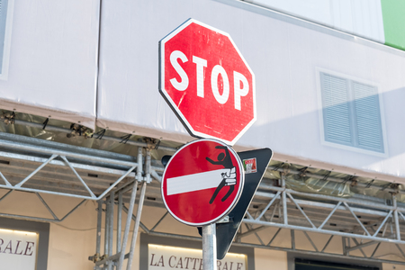 Florence, Italy - 19 May 2017 : Funny no entry road sign, Street art by Clet Abraham.のeditorial素材