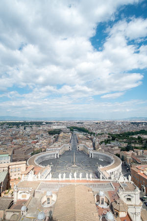 Saint Peter's Square, the large plaza in front of St. Peter's Basilica in Vatican City with the aerial view of Rome, Italy.のeditorial素材