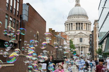 London, England - 21 October 2016 : Tourists walking around St Paul's Cathedral on 21 October 2016 in city of London, United Kingdomのeditorial素材