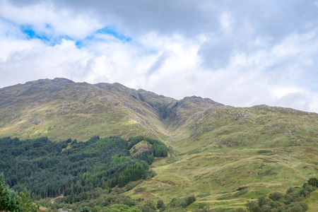 Scenic Landscape View of Mountain, Forest in Scottish Highland.の写真素材