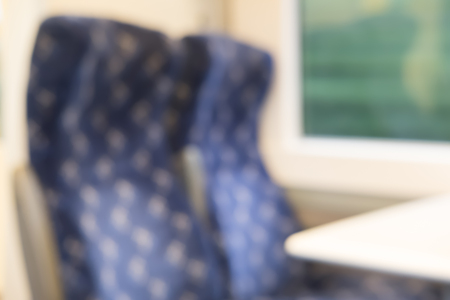 Blurred image bokeh of seating inside the train in United Kingdom