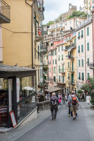 Riomaggiore, Italy - 18 September 2017: People walking around Riomaggiore, a village and comune in the province of La Spezia,One of the famous Cinque Terre.のeditorial素材