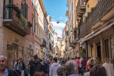 Verona, Italy - 17 September 2017: People walking in the city of Verona, the setting of Shakespeareâs "Romeo and Juliet."のeditorial素材