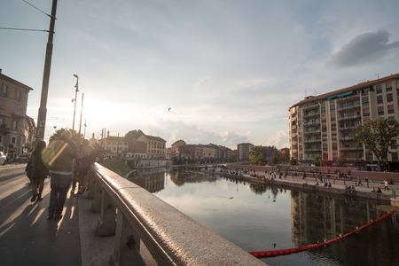 Milan, Italy - 16 September 2017: People walking around Naviglio Grande with building along the canalのeditorial素材