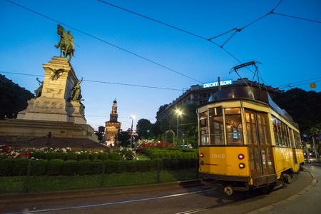 Milan, Italy - 21 May 2017: Historic Yellow Tram passing Milano Largo Cairoli. The tramway network is an important part of the public transportation of Milan.のeditorial素材